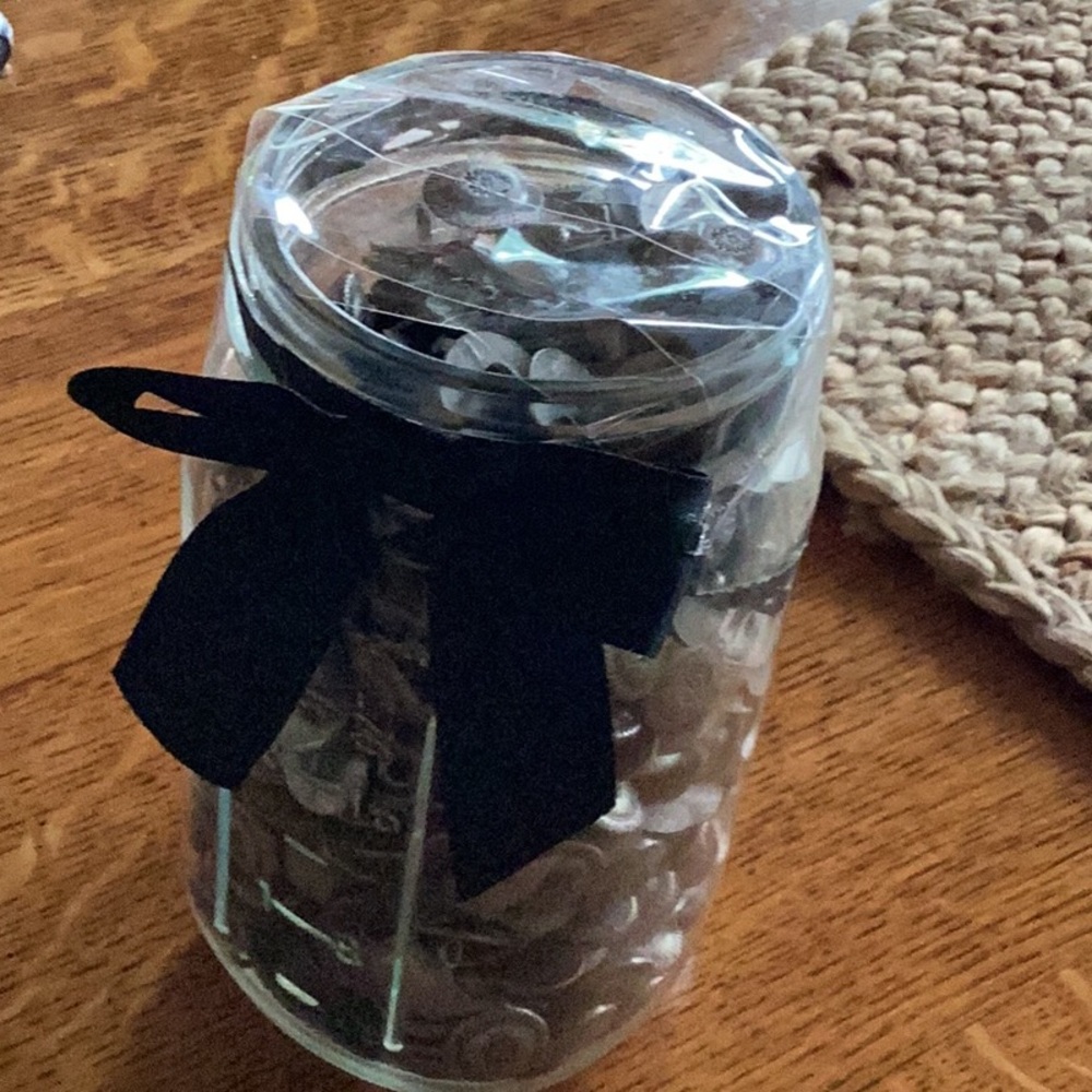 Mason jar full of buttons